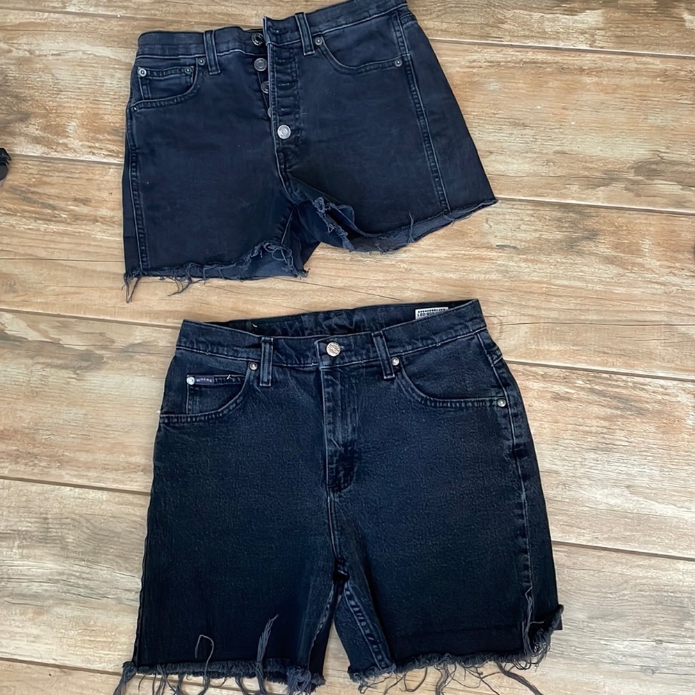 Two pairs of black denim shorts